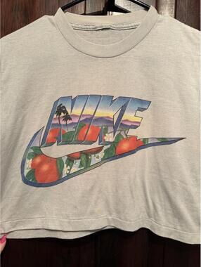 Nike Cropped Graphic T-Shirt with Fruit and Sunset Design Size Large